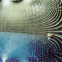 <p>
	Inside view of the Super-Kamiokande (SK) neutrino detector in Japan during waterfill. 10,000 photosensors detect the light from neutrino interactions in 50,000 tons of water.</p>
<p>
	Image courtesy: FNAL</p>
